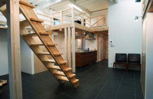 【間取り変更】 福島の山小屋を再現するために、もともとご主人の仕事場だった天井高3.5ｍのフォトスタジオの大空間を生かしロフトを配して２層構造としました。